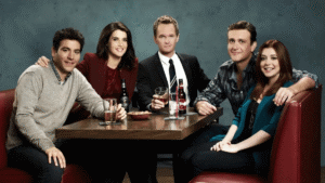 Ted, Robin, Barney, Marshall et Lily assis au bar